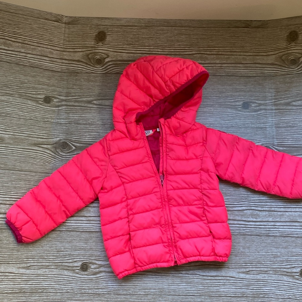 Pink puffer jacket with gap patch on sleeve